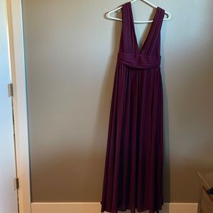 Long chiffon burgundy dress with deep V neckline. Like new, bridesmaids dress